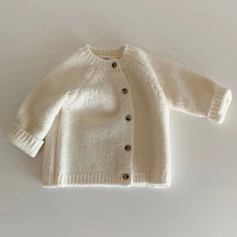 Cardigan Bebê Delicado Premium – Tricô Macio para Meia Estação