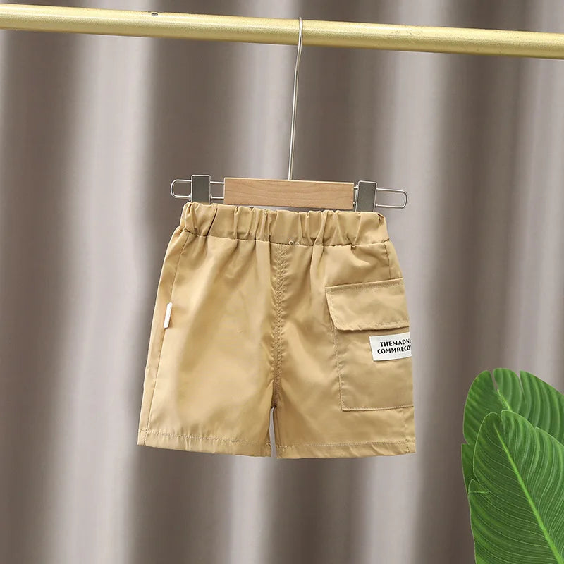 Beige baby shorts with elastic waistband and pocket, summer infant clothing