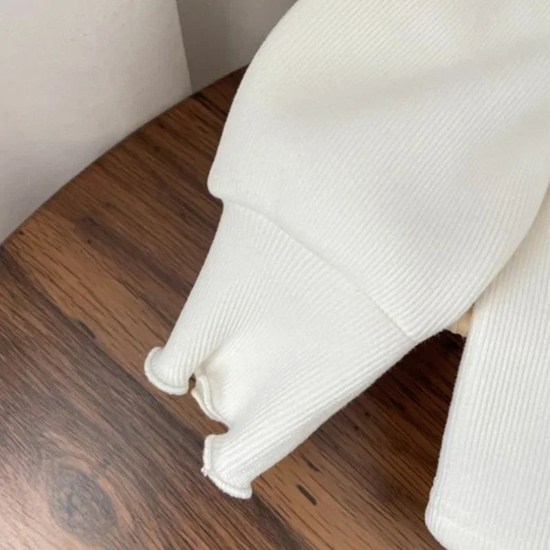 Suéter Bebê Tricot Floral Premium – Toque Macio e Conforto Térmico