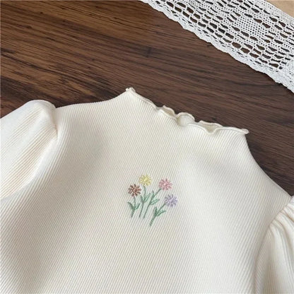 Suéter Bebê Tricot Floral Premium – Toque Macio e Conforto Térmico