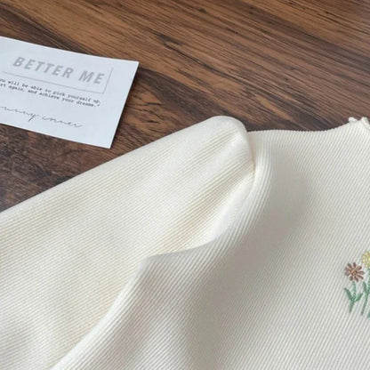 Suéter Bebê Tricot Floral Premium – Toque Macio e Conforto Térmico