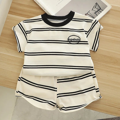 Striped baby clothes set with short-sleeve shirt and shorts in black and white cotton.